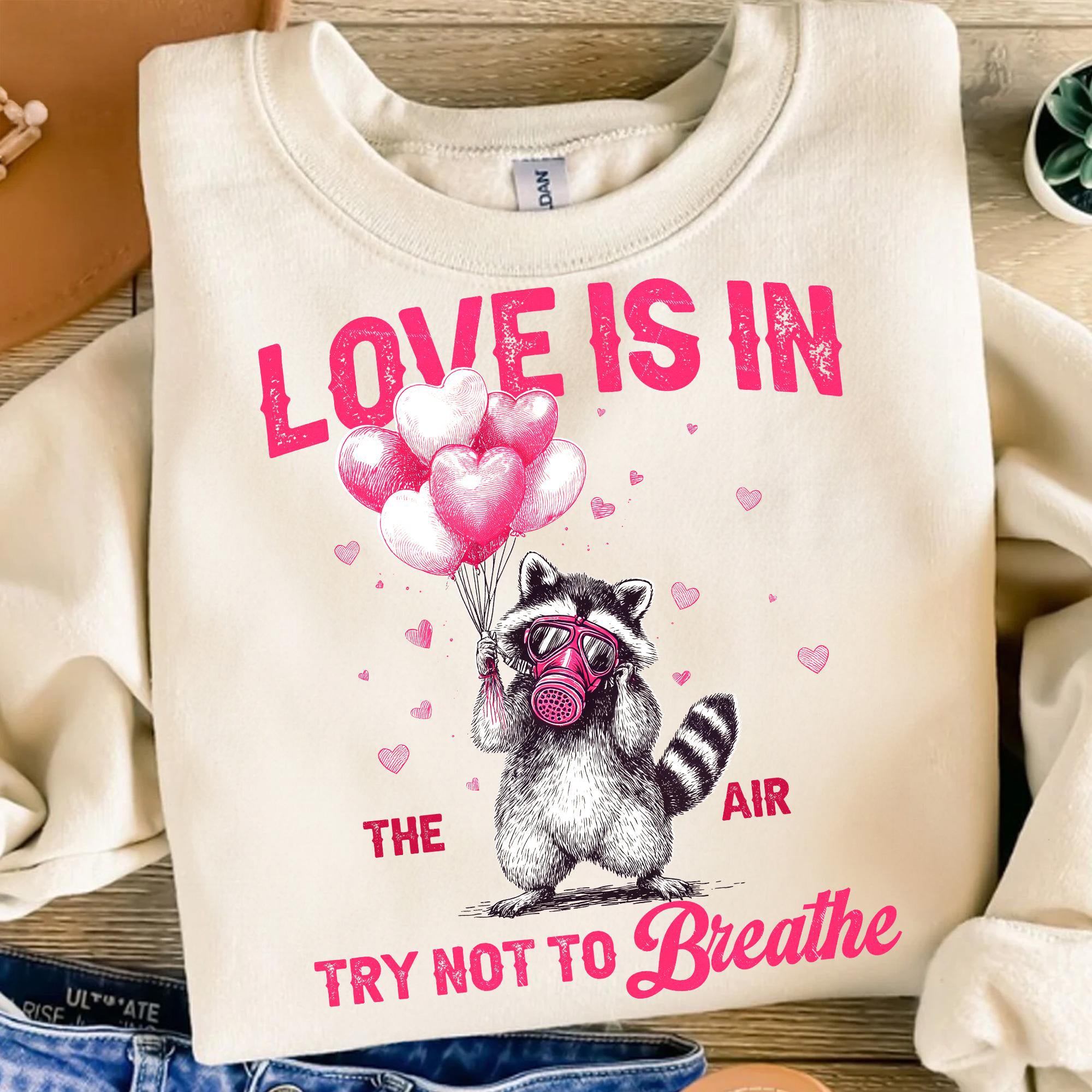 Love Is In The Air Try Not To Breathe Shirt, Funny Raccoon Valentine Sweatshirt, Sarcastic Anti Love Shirt, Feral Raccoon Humor