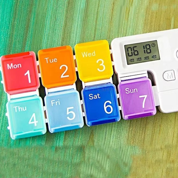 Intelligent timed medicine box, portable and detachable alarm clock, packaged medicine box, medication reminder device