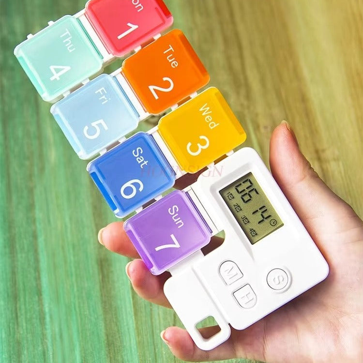 Intelligent timed medicine box, portable and detachable alarm clock, packaged medicine box, medication reminder device